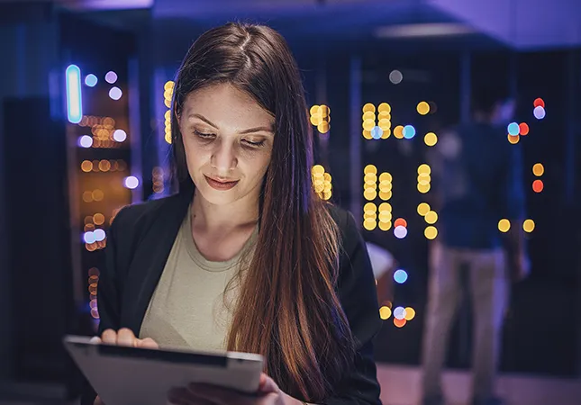 A woman using a tablet computer.